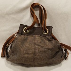 Brown pull-handle bag.